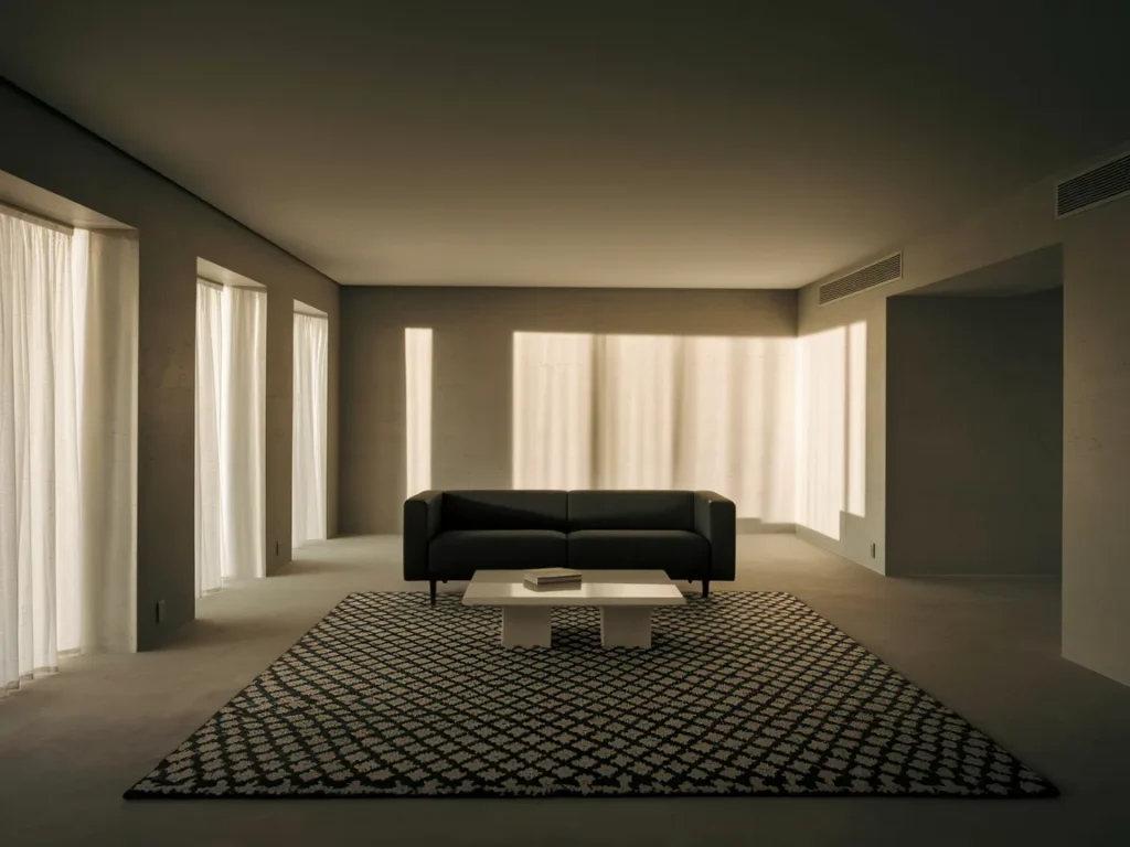 Black and white living room with large black