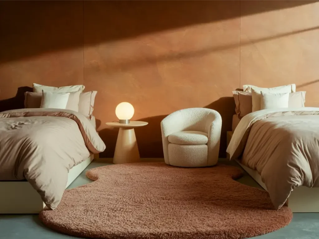 Dorm room with rug matching bedding colors