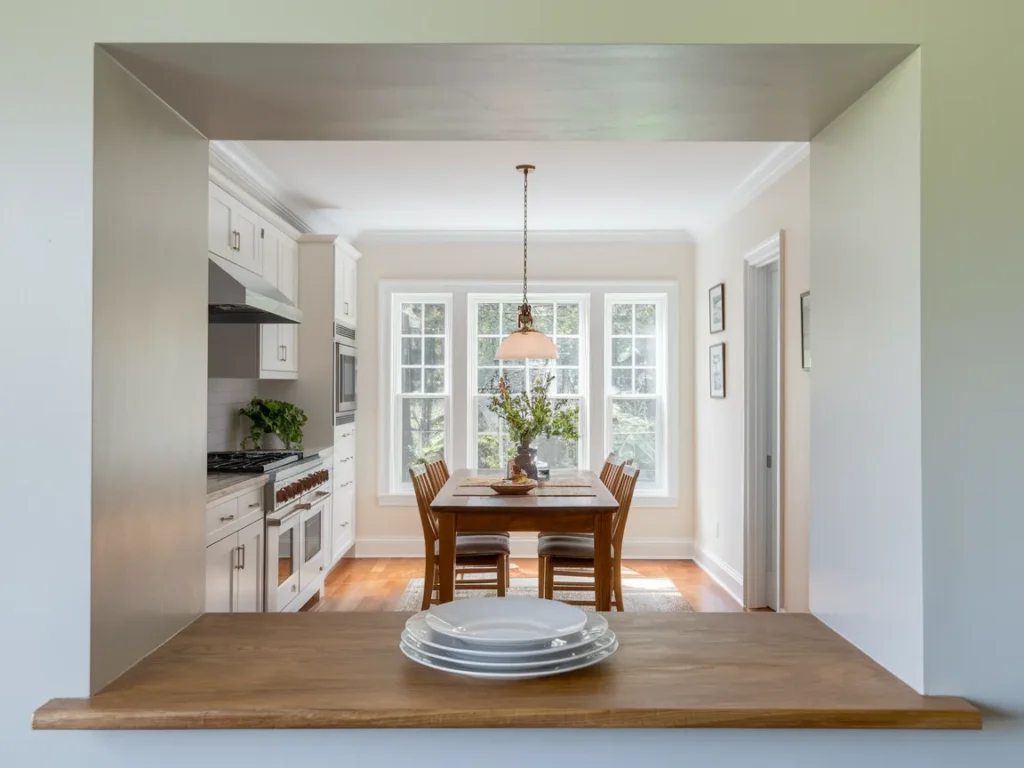 charming pass-through window cut into the wall between 