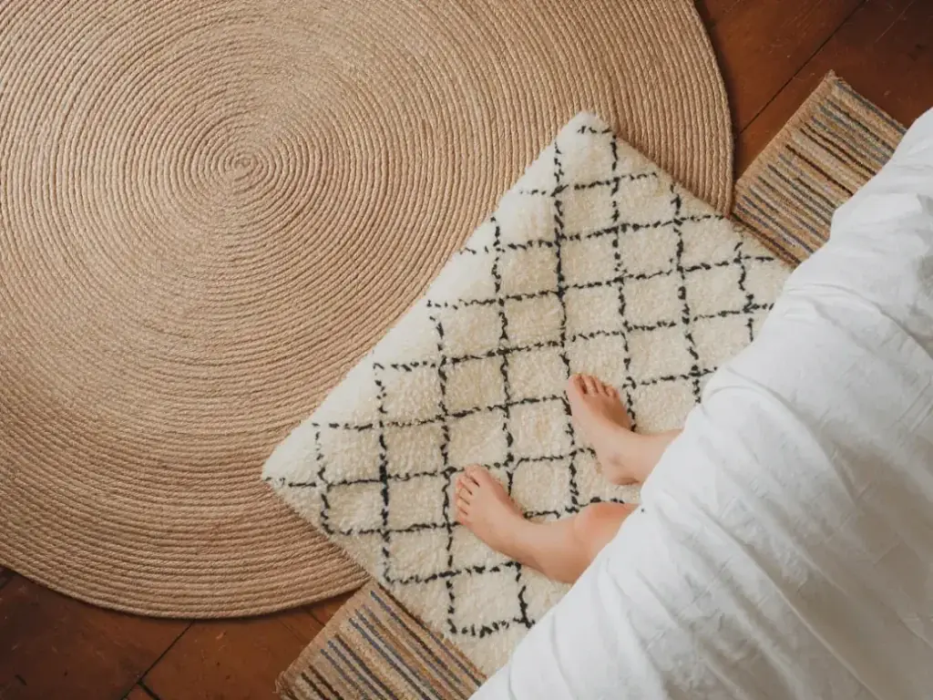bedroom view from above showing a large natural jute